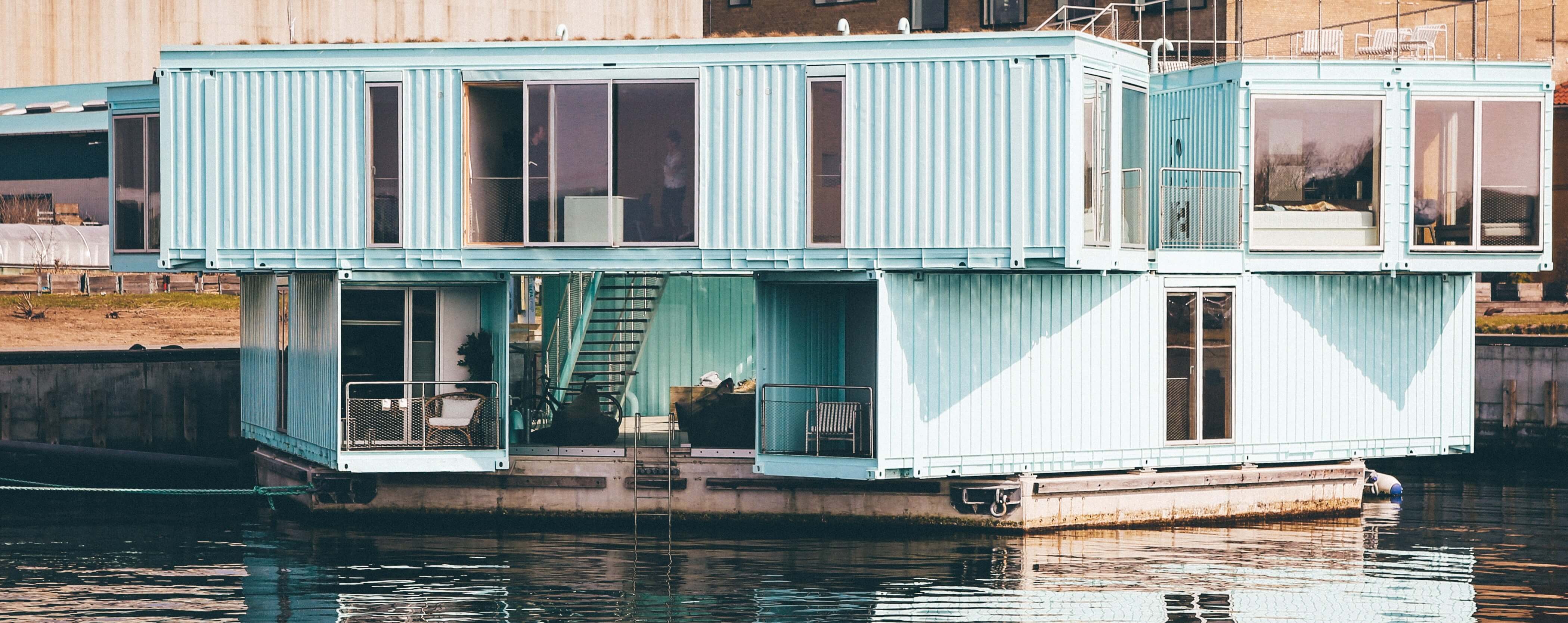 stacked-shipping-containers-waterfront